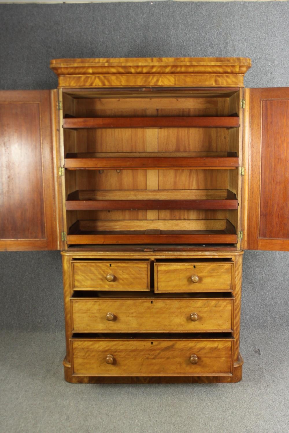 A Victorian satinwood linen press, fitted with slides above drawers on a plinth base. H.205 W.115 - Image 5 of 7