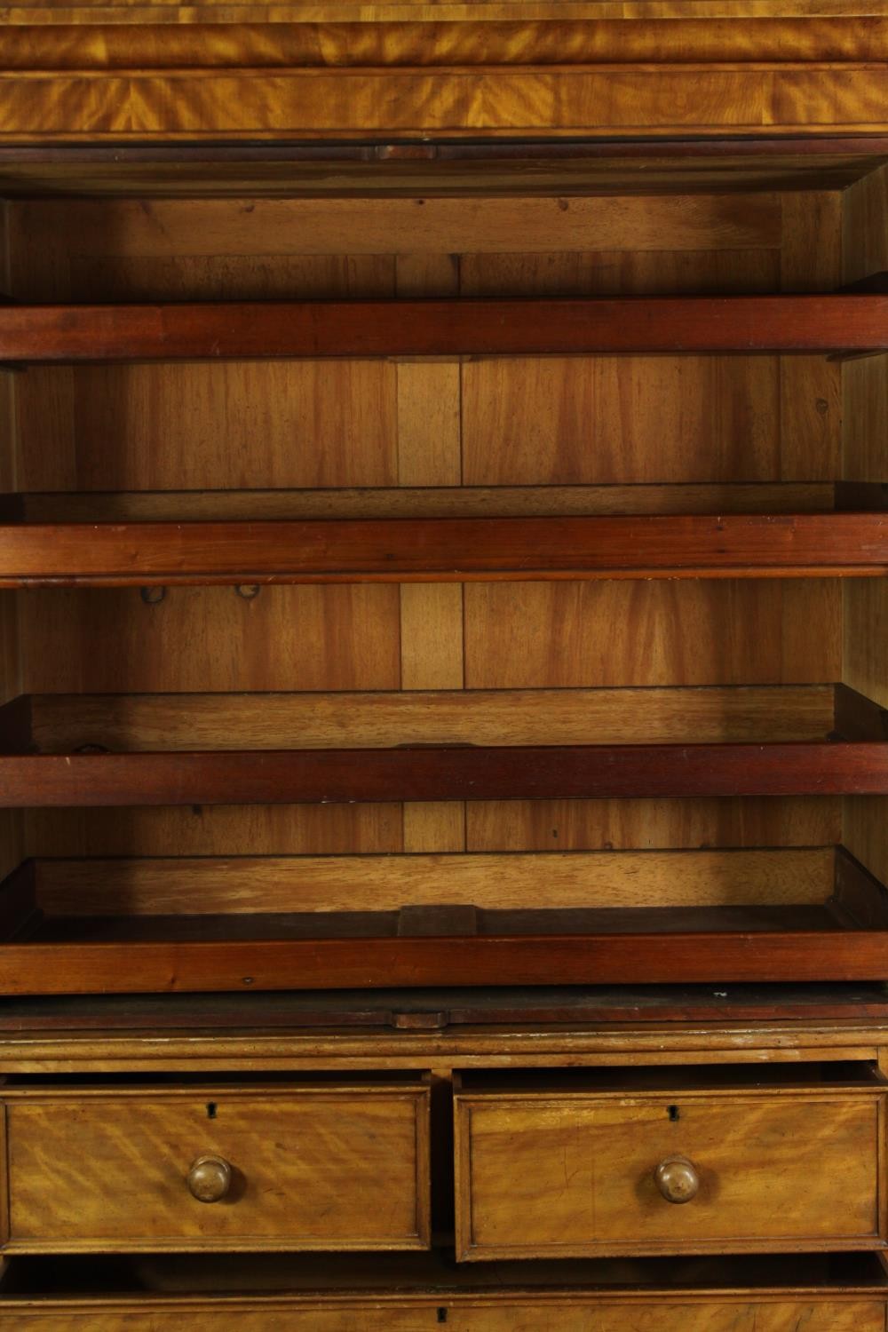 A Victorian satinwood linen press, fitted with slides above drawers on a plinth base. H.205 W.115 - Image 6 of 7