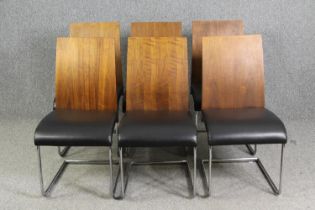 Dining chairs, a set of six, contemporary, chrome and leather upholstered.