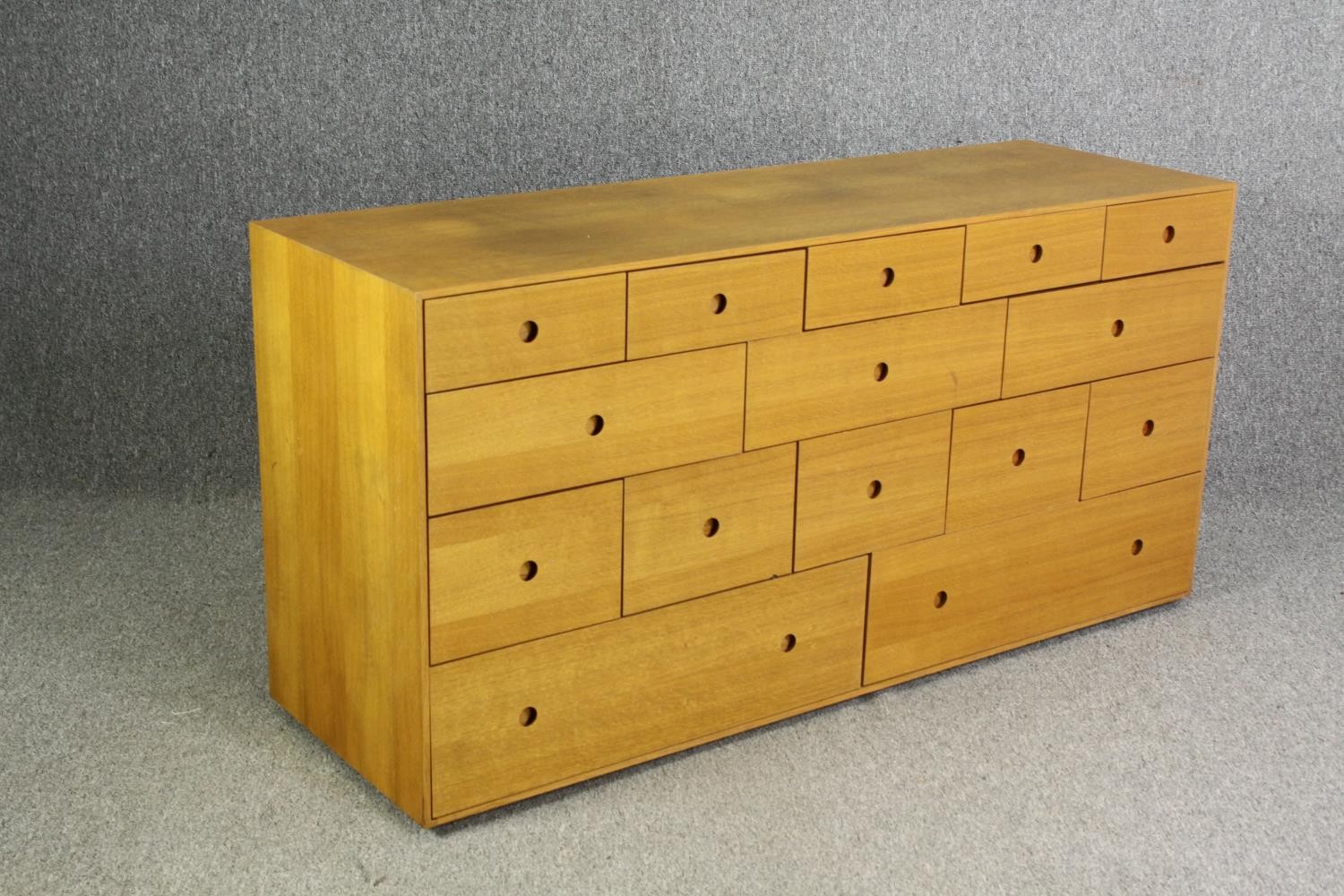 A contemporary light oak chest of drawers, H.73 W.150 D.48cm. - Image 2 of 7