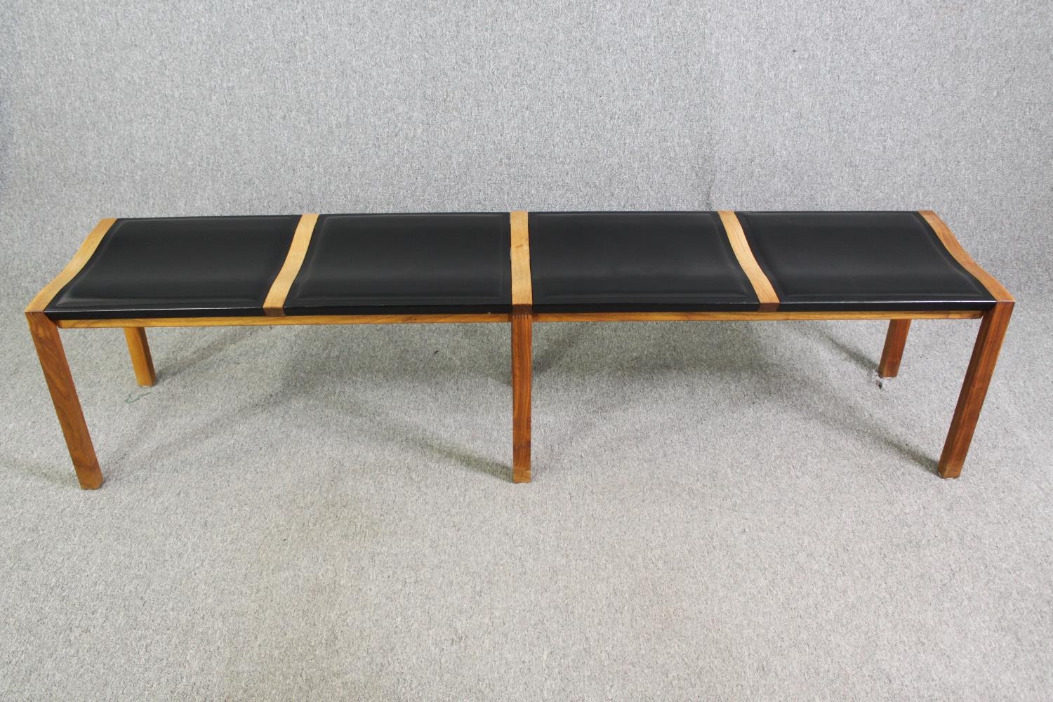 A pair of contemporary Heal's teak and black leather dining benches. H.48 W.200 D.45cm. (each). - Image 2 of 8