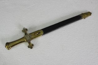 Robert Mole & Sons, Birmingham, a Victorian brass handled band sword and scabbard, blade stamped