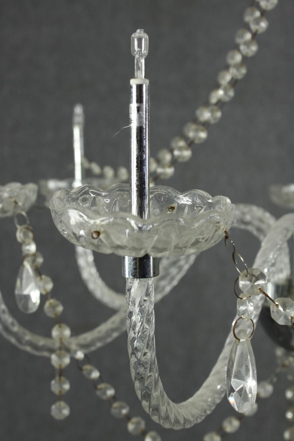An eight branch crystal chandelier with swags and drops. (needs repair) H.72 Dia.60cm. - Image 5 of 5