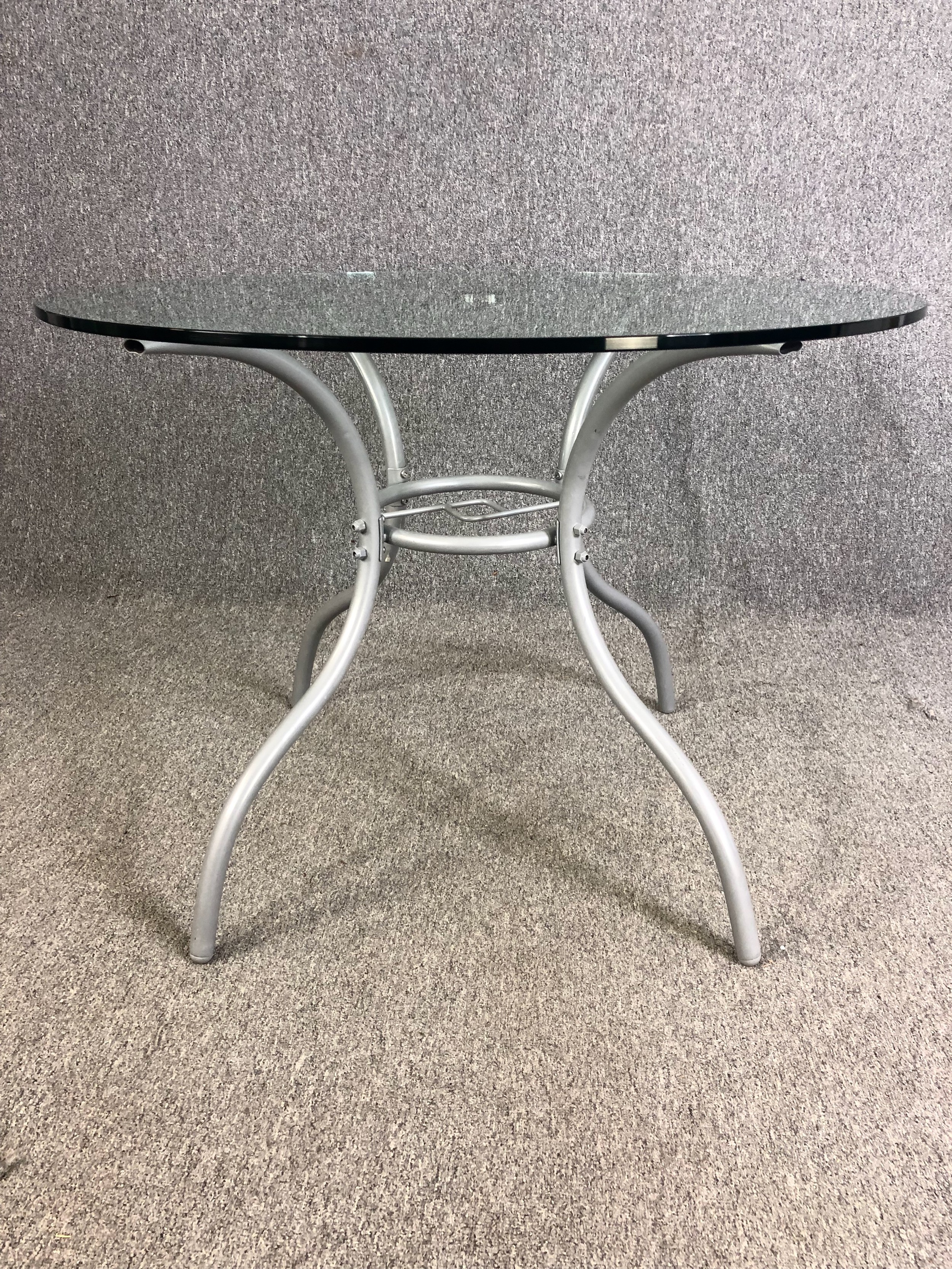 A contemporary glass and metal occasional table. H.72 Dia.100cm. (Associated pieces, top not - Image 2 of 6