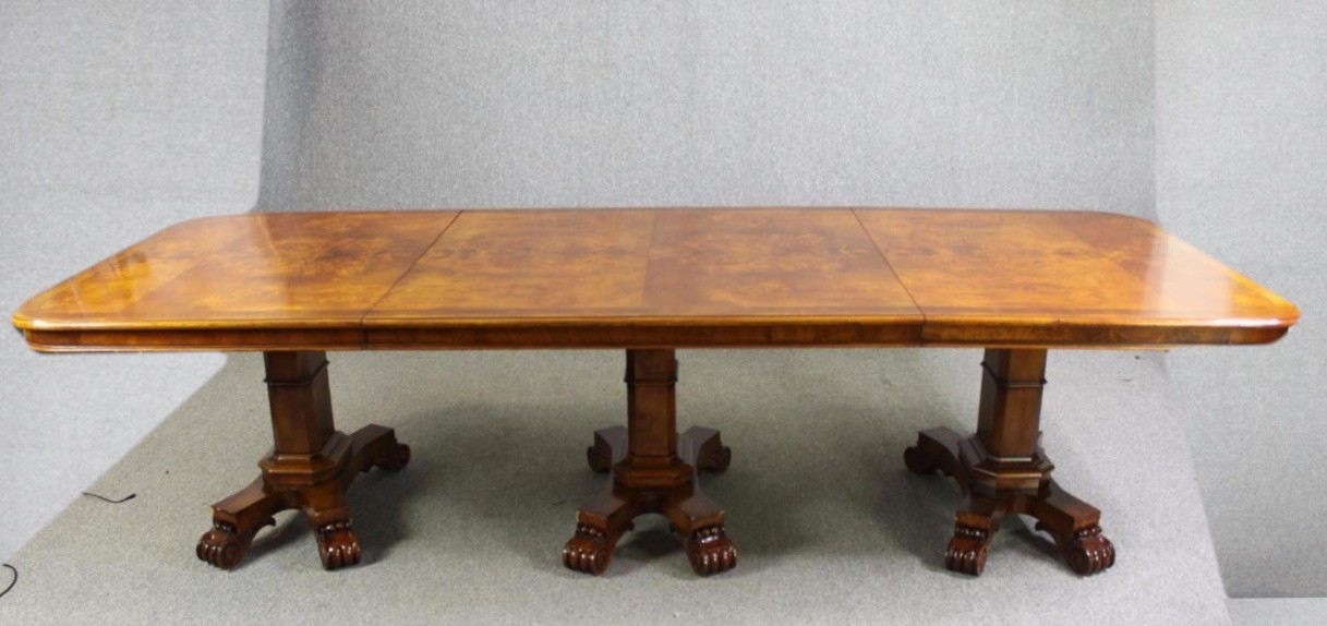 A walnut triple pedestal dining table, in the Victorian style, 20th century, H.78 W.426 D.123cm.