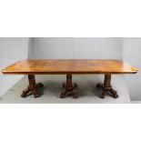 A walnut triple pedestal dining table, in the Victorian style, 20th century, H.78 W.426 D.123cm.