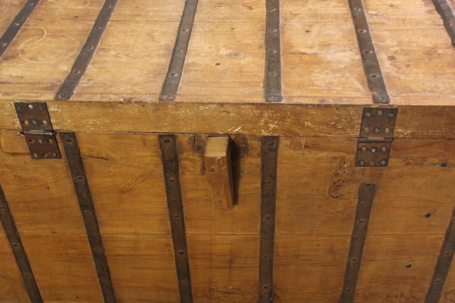 A continental pitch pine and metal bound lidded chest, probably 19th century, H.70 W.110 D.60cm. - Image 10 of 12