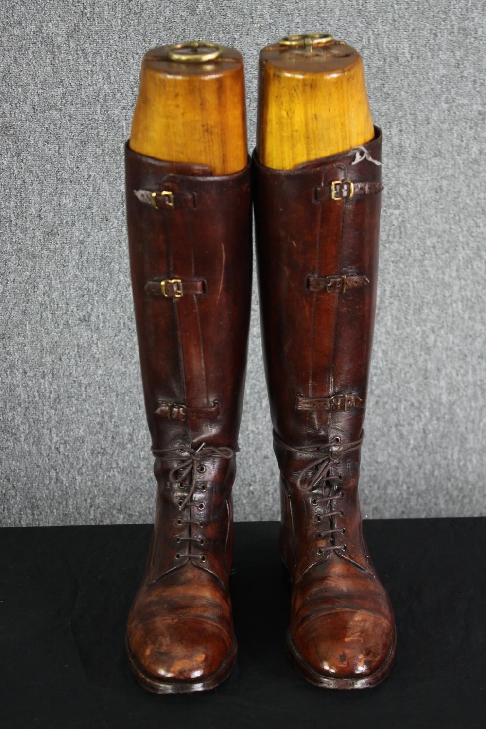 A pair of vintage brown leather ladies riding boots within shoe trees. H.47. No size.