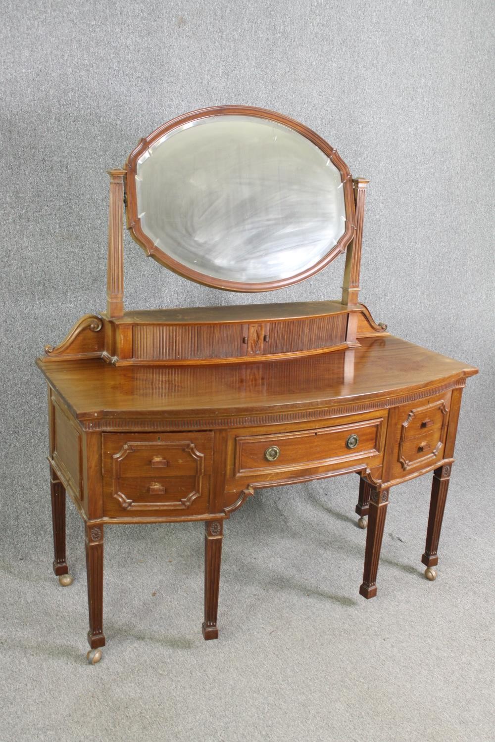 A George III style walnut dressing table, 20th century. H.164 W.136 D.63cm. - Image 3 of 10