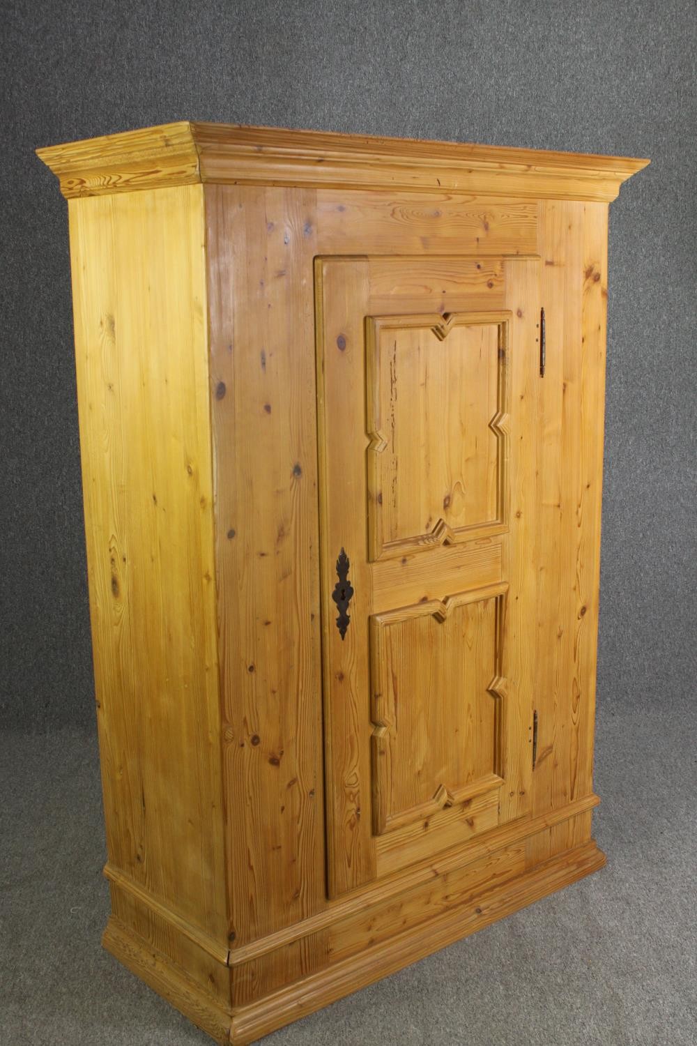 A continental pine hall cupboard or wardrobe. H.174 W.123 D.56cm. - Image 2 of 4