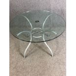 A contemporary glass and metal occasional table. H.72 Dia.100cm. (Associated pieces, top not