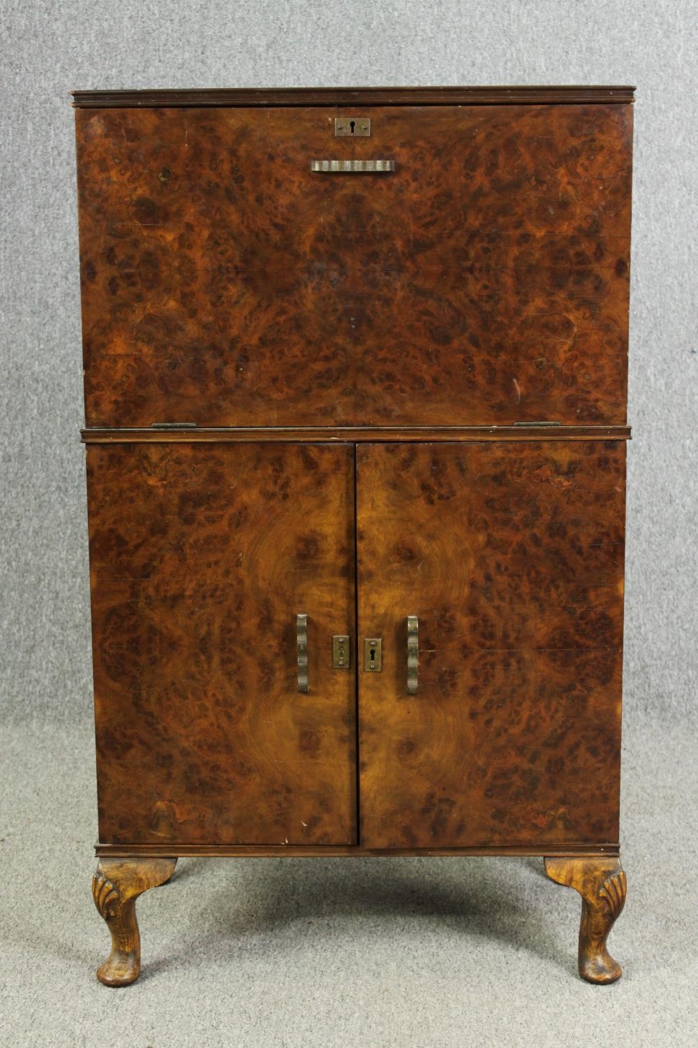 An Art Deco burr walnut cocktail cabinet, circa 1930, enclosing various cut drinking glasses and a - Image 2 of 12