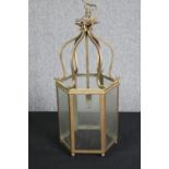 A brass hexagonal hanging lantern. H.55cm.