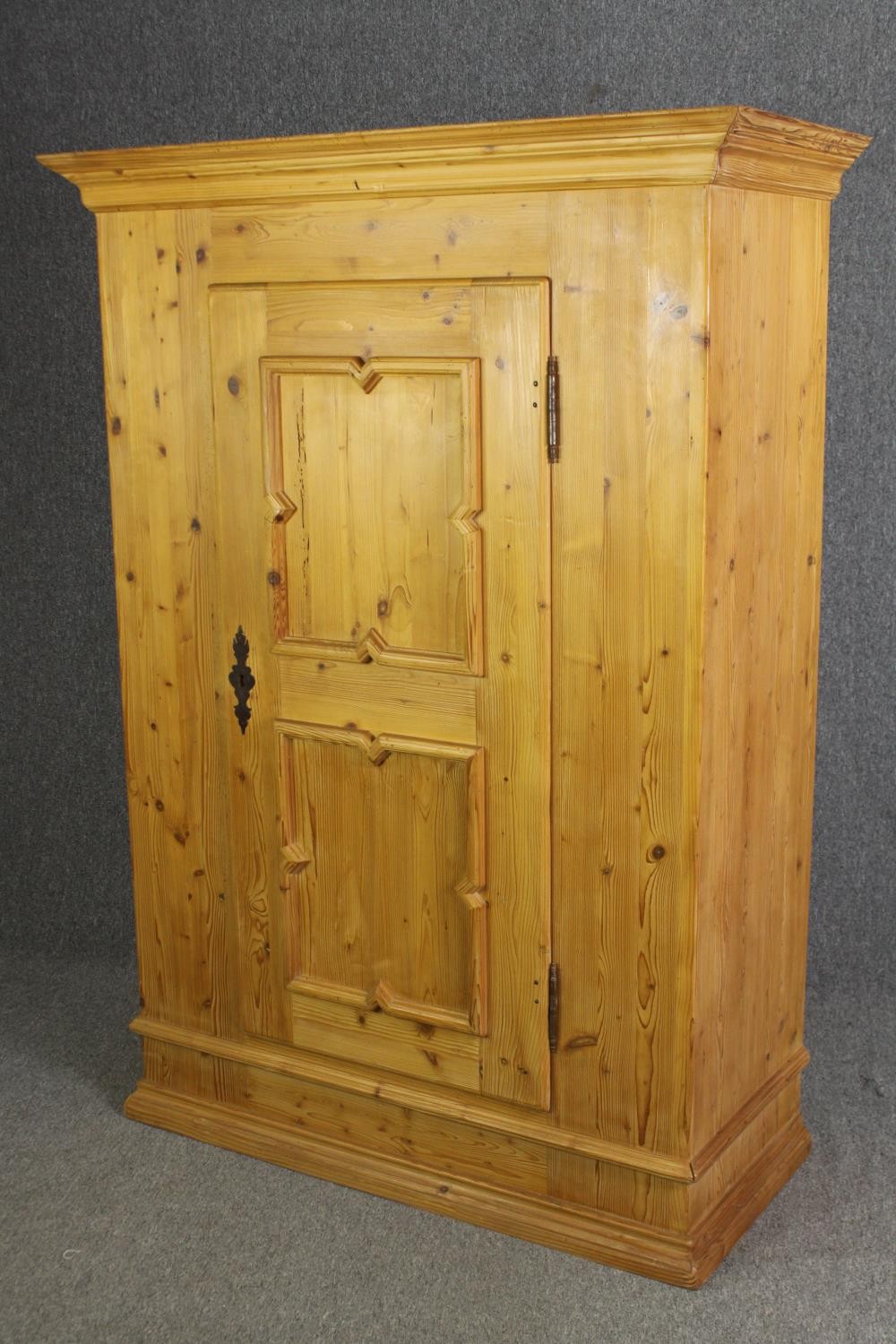 A continental pine hall cupboard or wardrobe. H.174 W.123 D.56cm. - Image 3 of 4