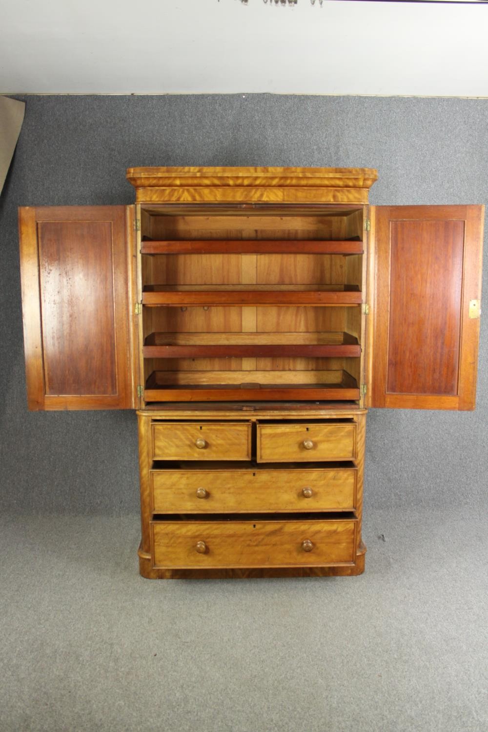 A Victorian satinwood linen press, fitted with slides above drawers on a plinth base. H.205 W.115 - Image 4 of 7