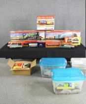 A collection of boxed Hornby and Bachmann train sets and rolling stock items. H.30 W.80 D.8cm. (box)