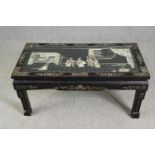 A 1920's Chinese style simulated lacquer and inlaid coffee table, H.46 W.102 D.51cm.