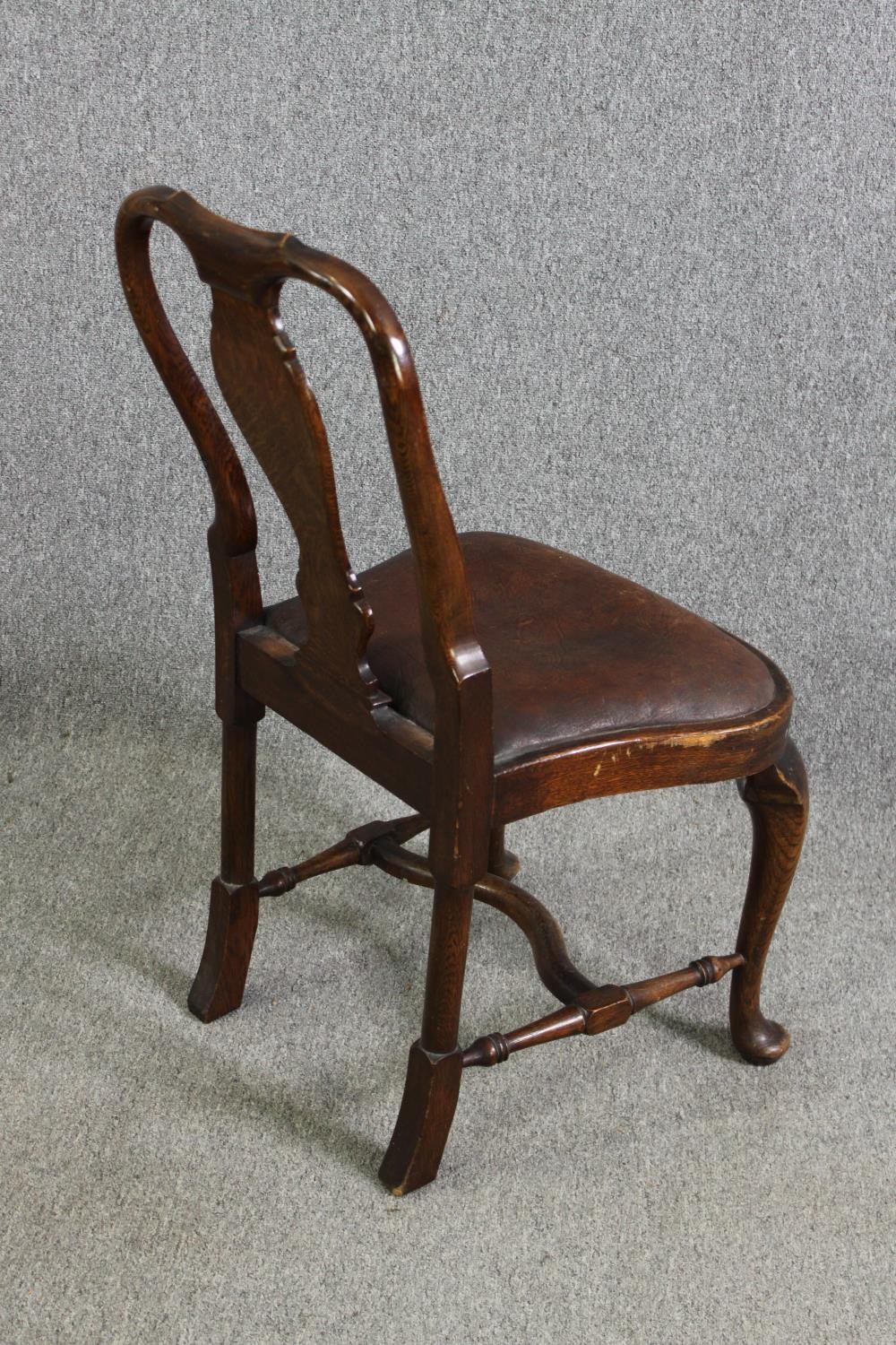 A set of four early 20th century oak George I style dining chairs with leather seats. (One stretcher - Image 5 of 7