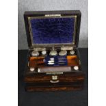 A Victorian coromandel travelling vanity box, with associated silver and glass fitted interior, H.18