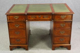 A burr walnut and satinwood inlaid Georgian style pedestal desk with inset leather top, 20th century