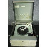 A vintage portable turntable / record player, Garrard in a Bush case. H.24 W.38 D.44cm.