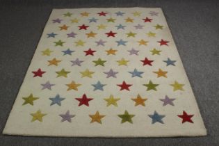 A modern carpet with star pattern. L.200 W.142cm.