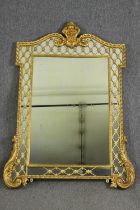 A 19th century Régence style carved giltwood overmantel mirror. H.157 W.115cm.