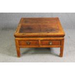 A Chinese hardwood coffee table, first half 20th century. H.50 W.86 D.86cm.