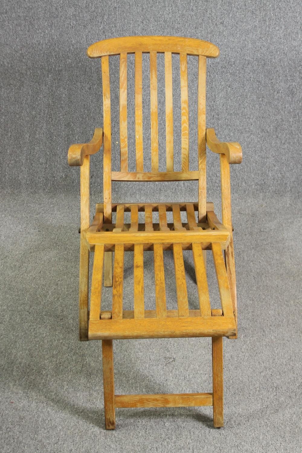 An oak folding steamer chair, first quarter 20th century, H.87 W.60 D.140cm. - Image 8 of 12