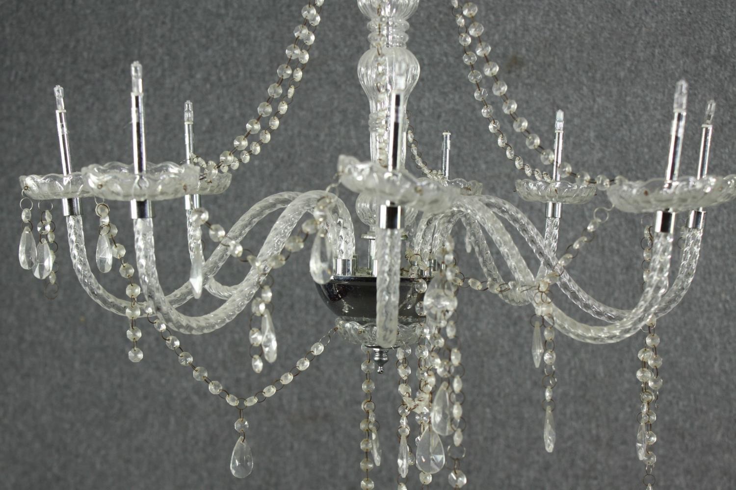 An eight branch crystal chandelier with swags and drops. (needs repair) H.72 Dia.60cm. - Image 2 of 5