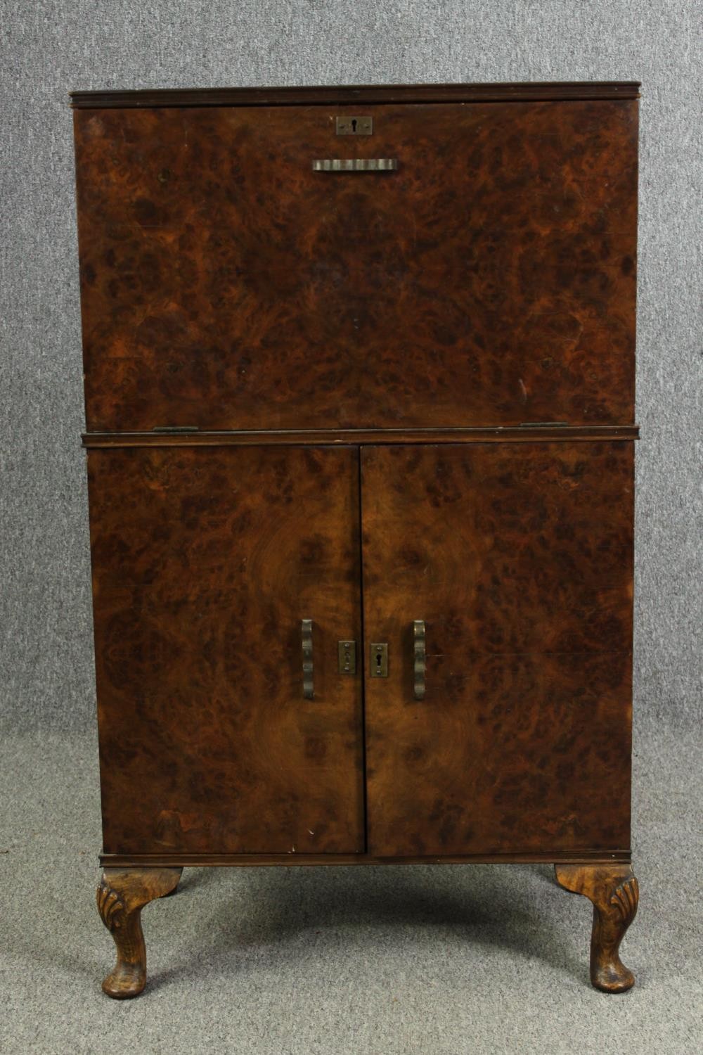 An Art Deco burr walnut cocktail cabinet, circa 1930, enclosing various cut drinking glasses and a - Image 12 of 12