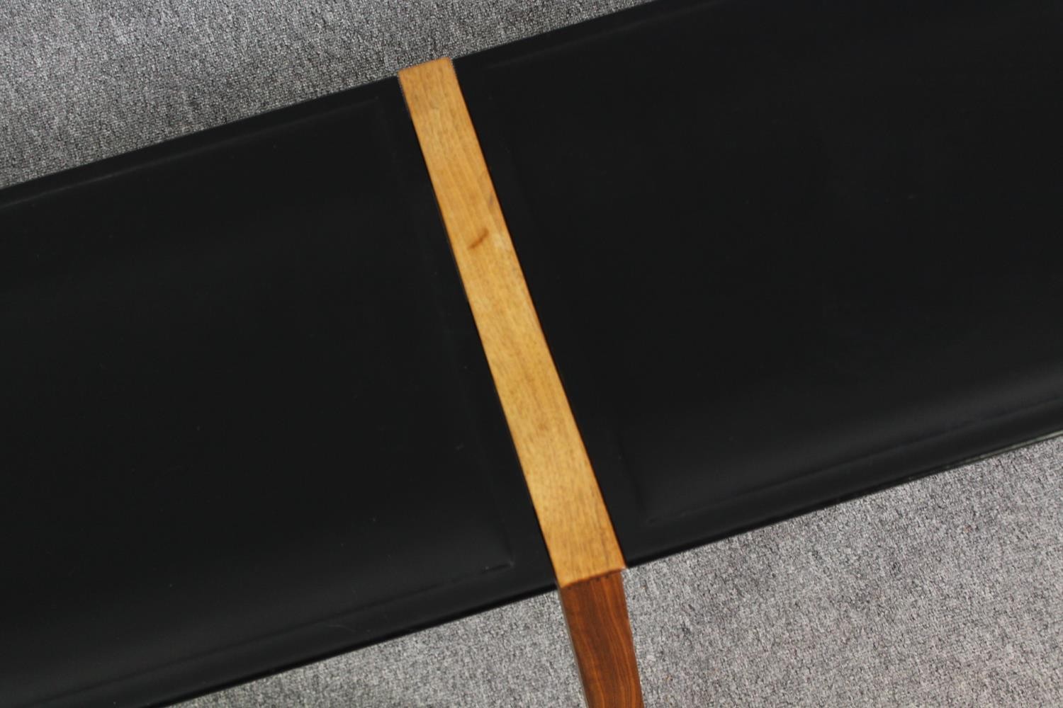 A pair of contemporary Heal's teak and black leather dining benches. H.48 W.200 D.45cm. (each). - Image 6 of 8