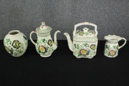 A collection of Mason's pottery, viz: Teapot, coffee pot, vase and a jug. H.23cm.(largest).