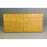 A contemporary light oak chest of drawers, H.73 W.150 D.48cm.