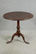 A George II mahogany tilt-top occasional table. H.71 Dia.76cm.