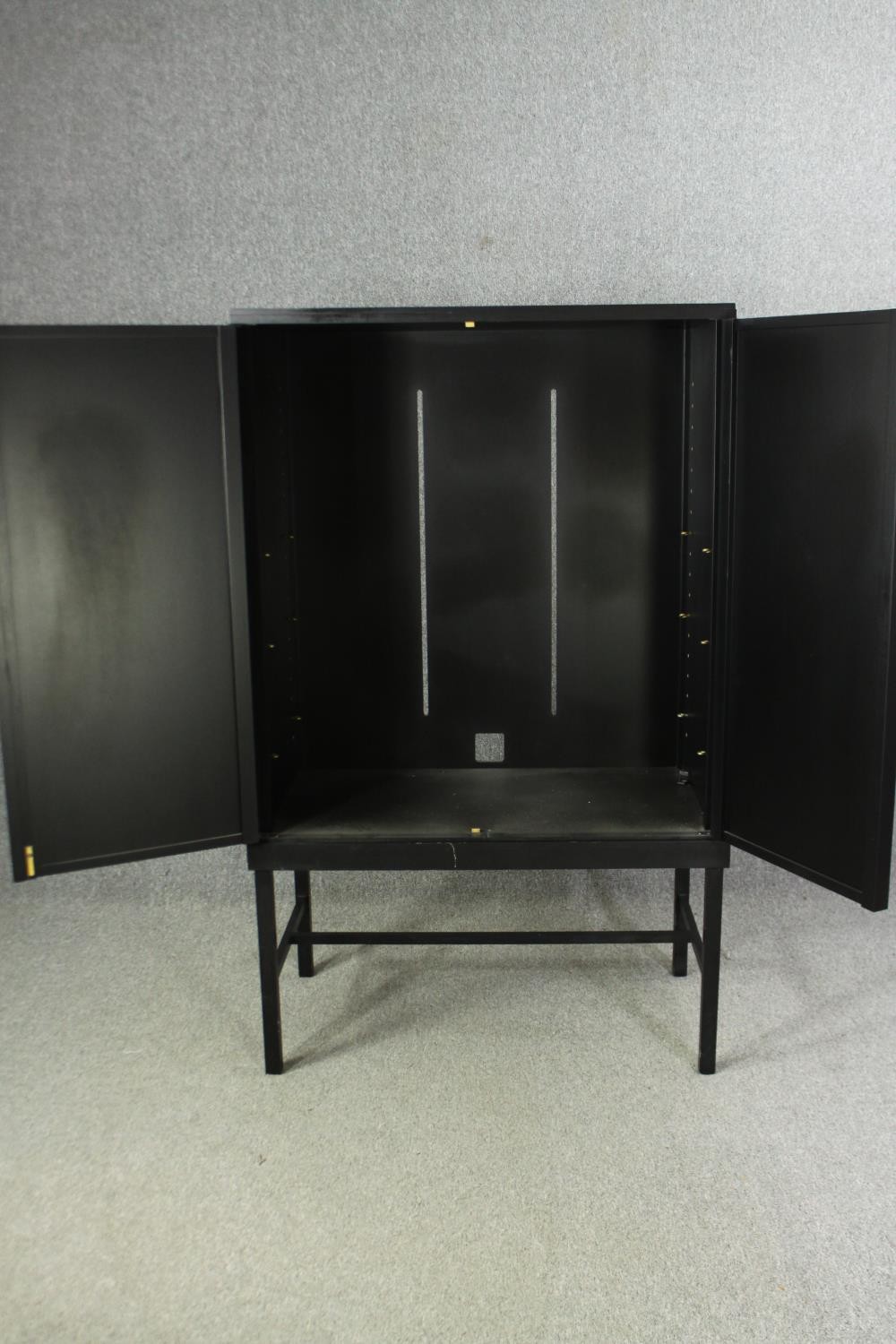 A contemporary ebonized cabinet on stand. H.169 W.102 D.60cm. - Image 5 of 7