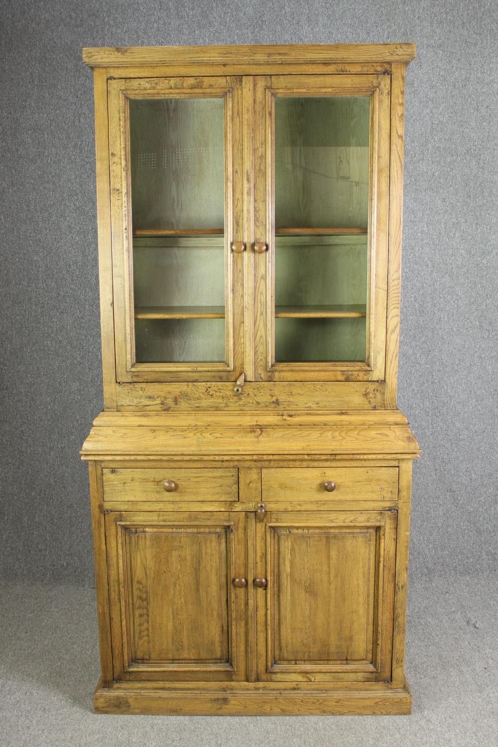 An oak dresser, 20th century, H.210 W.104 D.41cm.