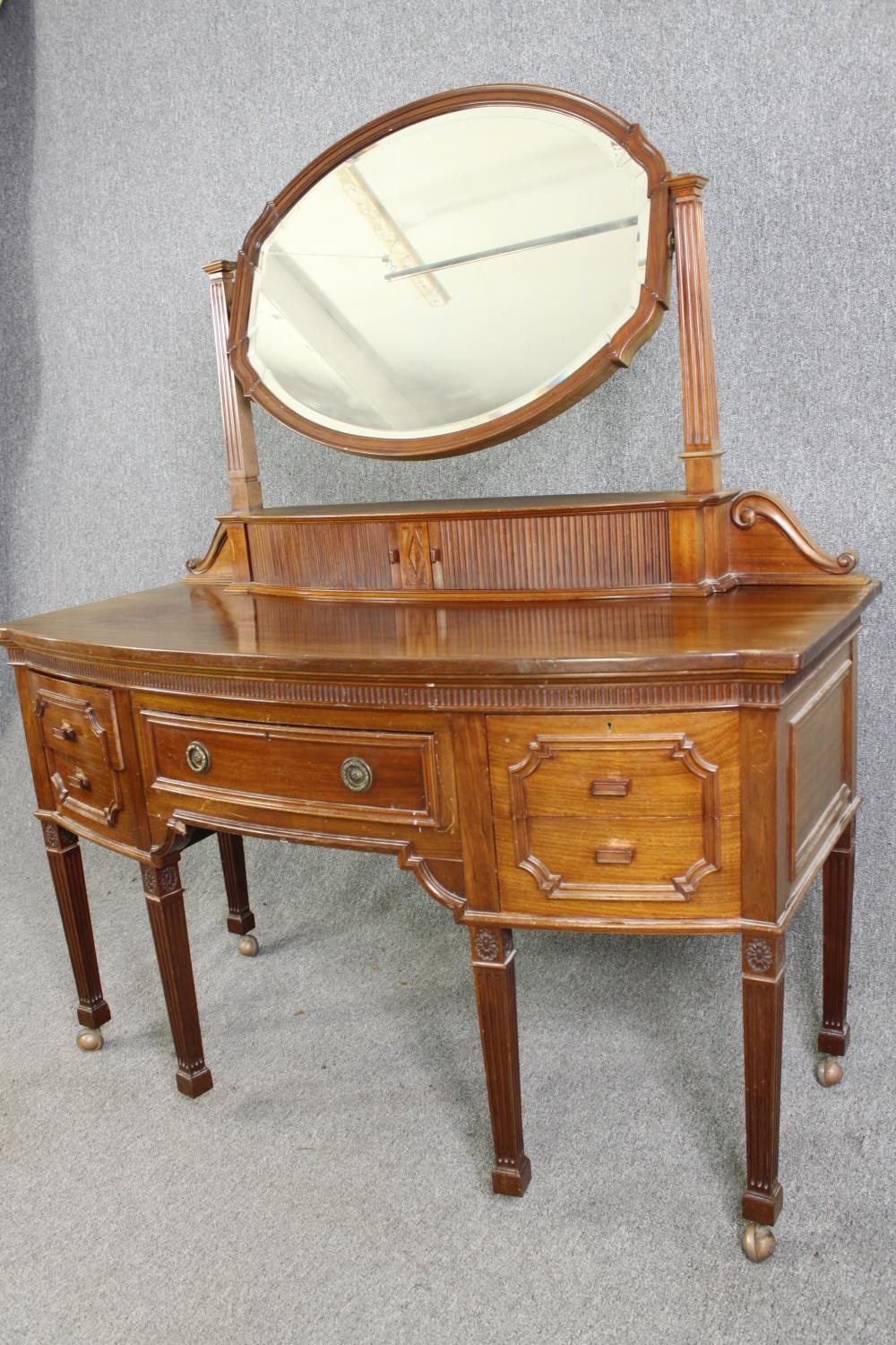 A George III style walnut dressing table, 20th century. H.164 W.136 D.63cm. - Image 4 of 10