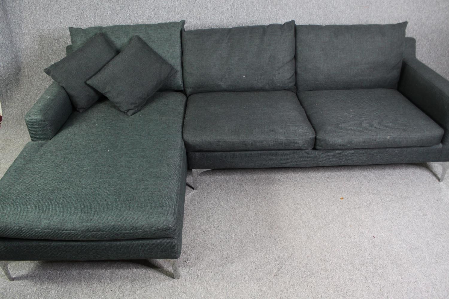 A contemporary grey upholstered corner sofa with chrome supports, H.80 W.246 D.150cm. - Image 7 of 7