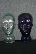 Two 20th century glass milliners mannequin pressed glass heads having moulded features, one dark