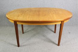 Dining table, mid century teak with integral butterfly extension leaf. H.75 W.197 (ext) D.92cm.