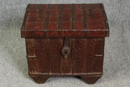 A small painted and metal bound Indian trunk. H.35 W.43 D.33cm.