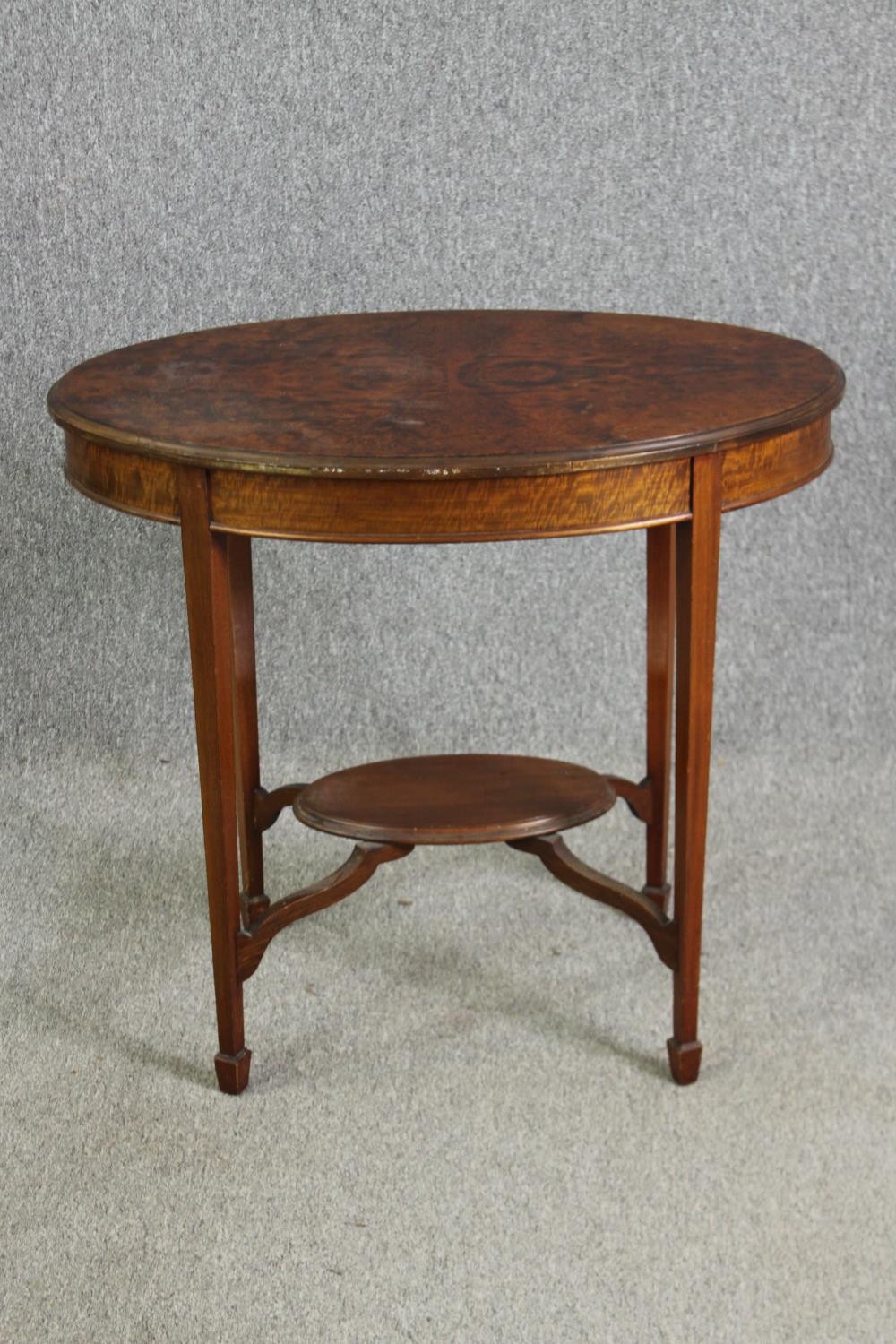 A burr wood side table, 19th century, in the George III style. H.74 W.80 D.53cm.