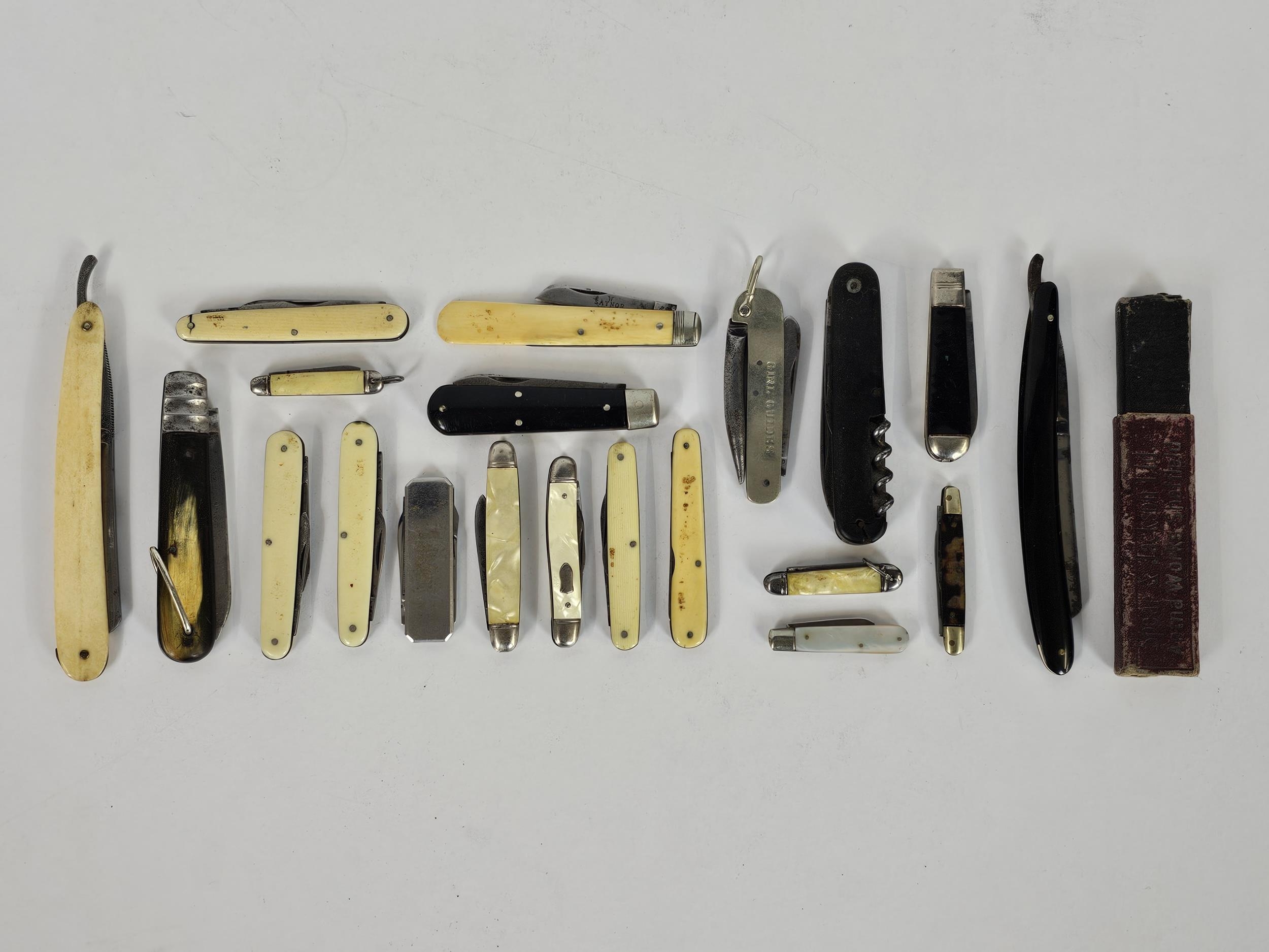 A quantity of penknives and straight-edge razors