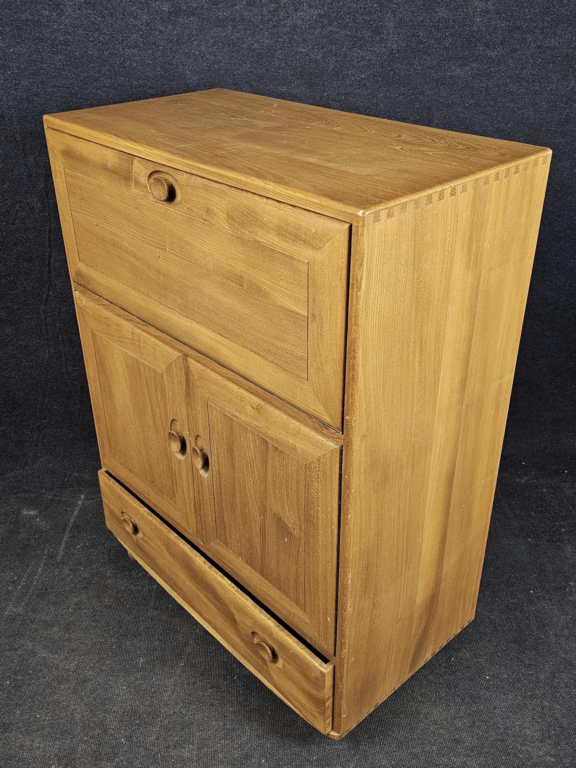 An Ercol elm side cabinet with fall front. H.110 W.83 D.45.cm - Image 2 of 8