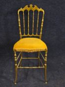 A brass salon chair