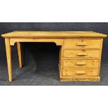 A pine desk, circa 1940. H. 75 W.153 D.75cm.