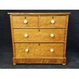 A Victorian satinwood chest of drawers. H. 91 W.96 D.49cm.
