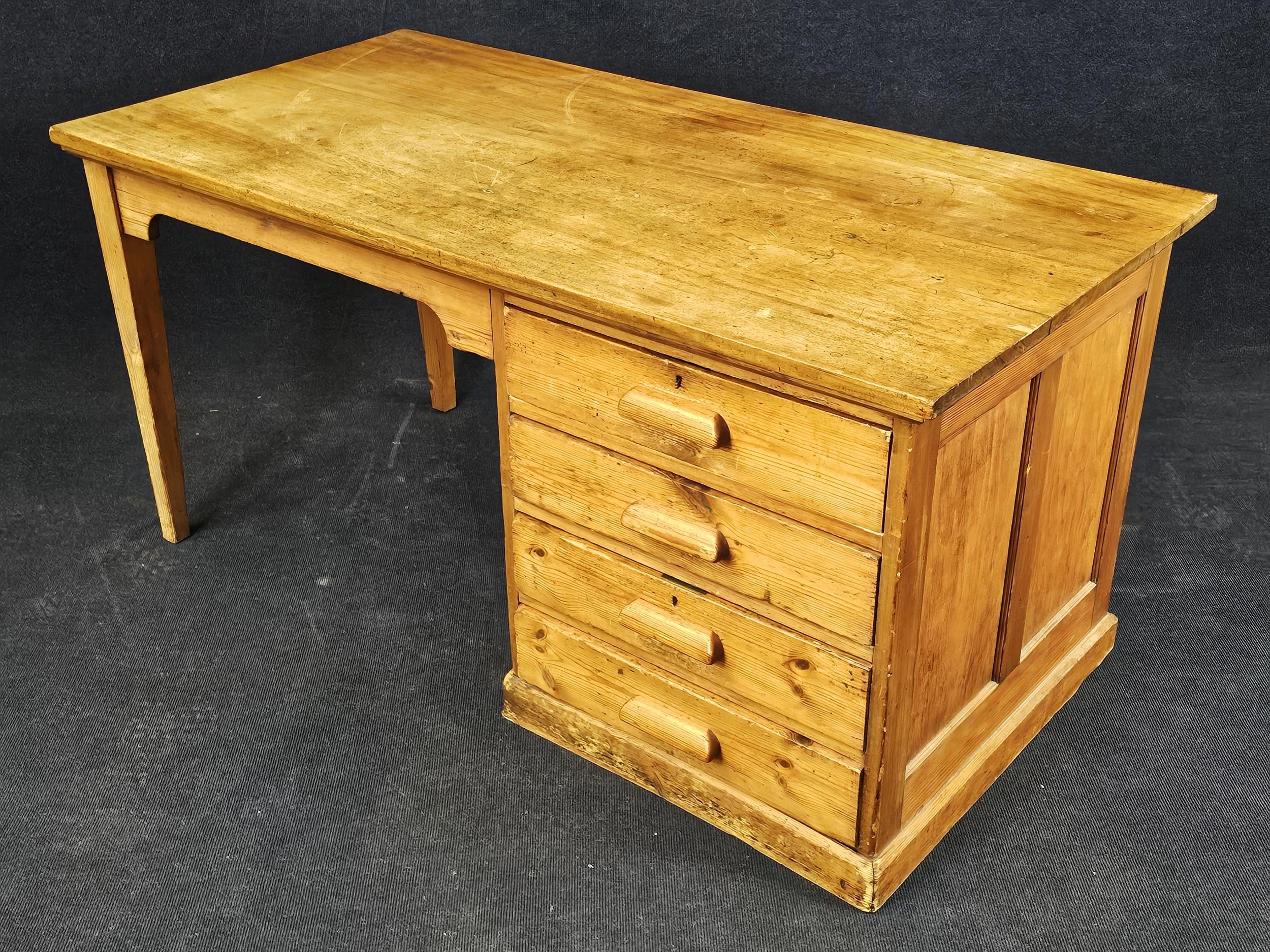 A pine desk, circa 1940. H. 75 W.153 D.75cm. - Image 7 of 7