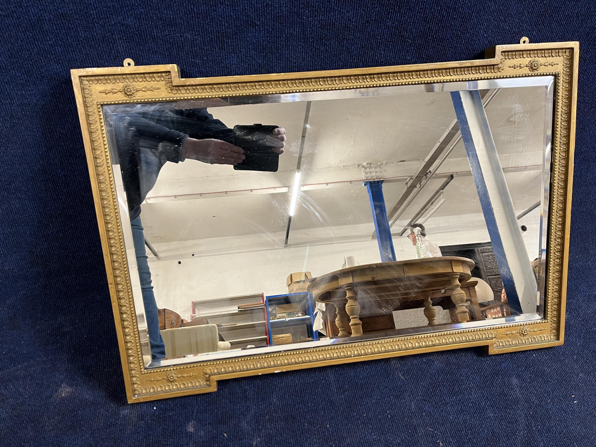 A 19th century style giltwood wall mirror. H.52 W.82.cm